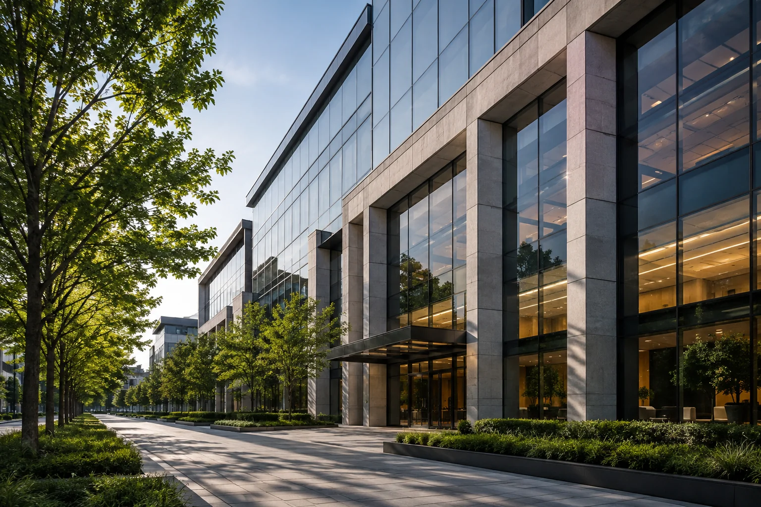 Modern glass office campus and pedestrian walkway